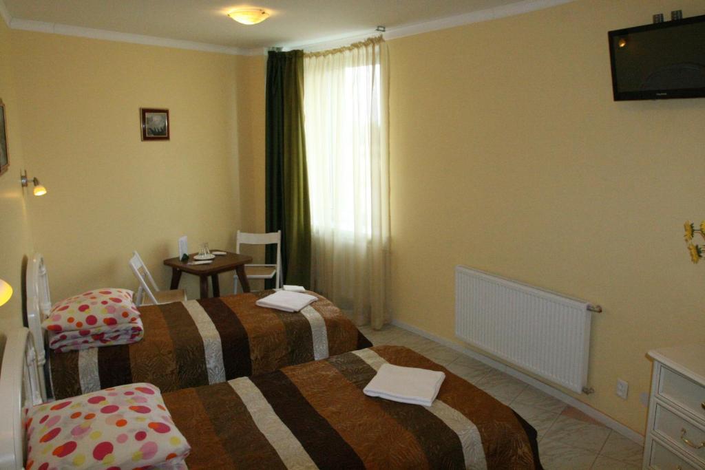 Vaivorykste Hotel Šiauliai Стая снимка